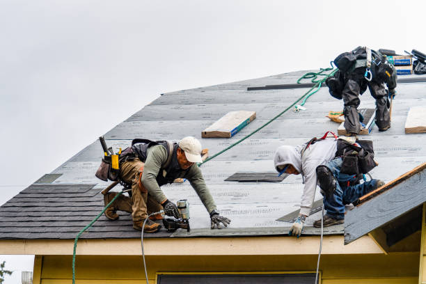 Professional Roofing technician working in East Greenwich, RI